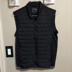 Black vest kids size L , zipper has some waves , when closed pictures shows